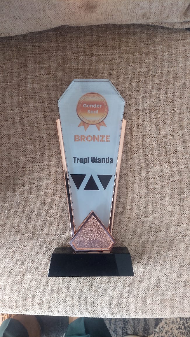 Gender Seal Bronze award trophy presented to Tropi Wanda